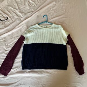 Maroon, white and blue sweater
